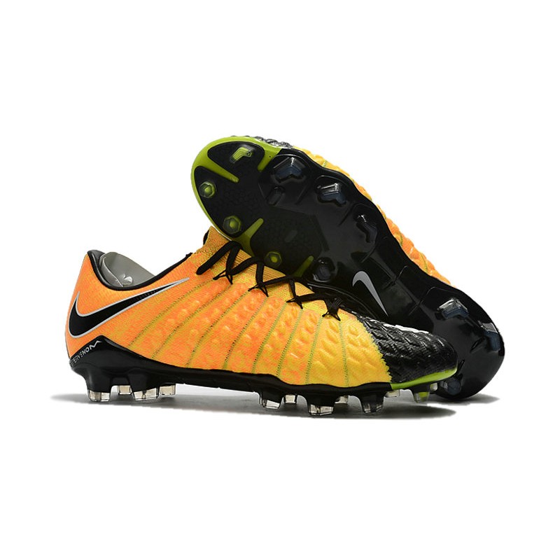 nike black and yellow soccer cleats