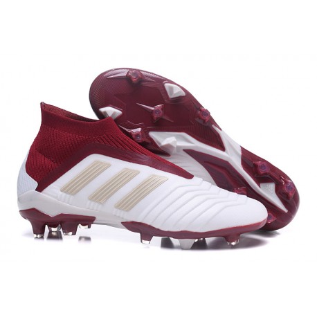 red predator cleats