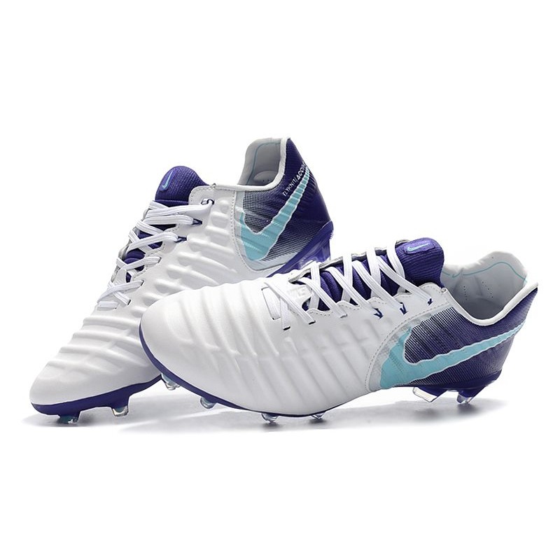 white leather soccer cleats