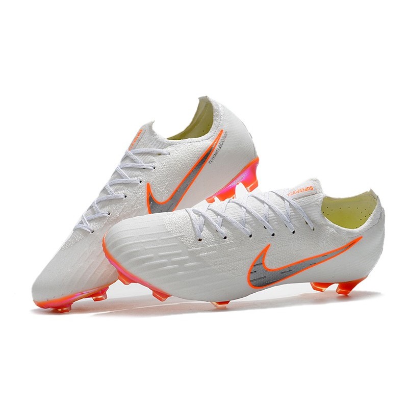 white and orange mercurial