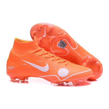 orange and white cleats