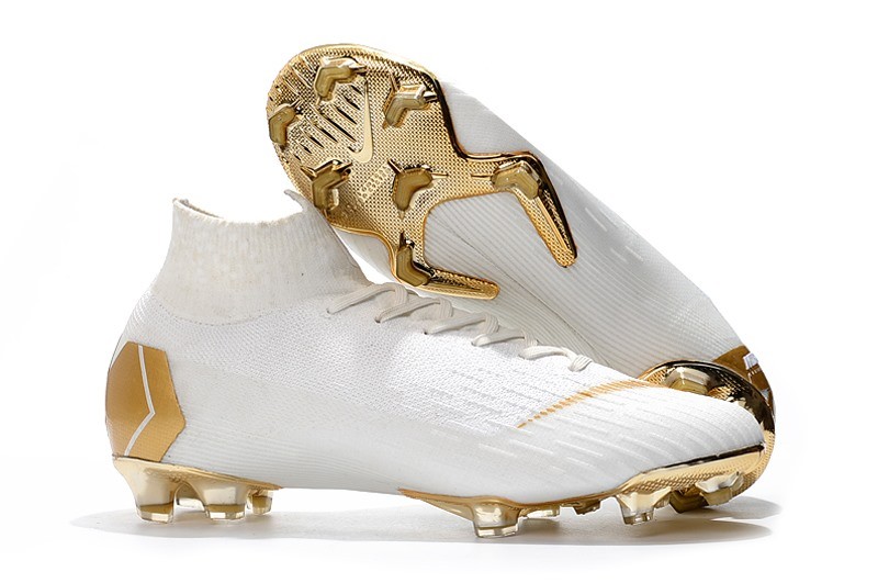 gold football boots nike