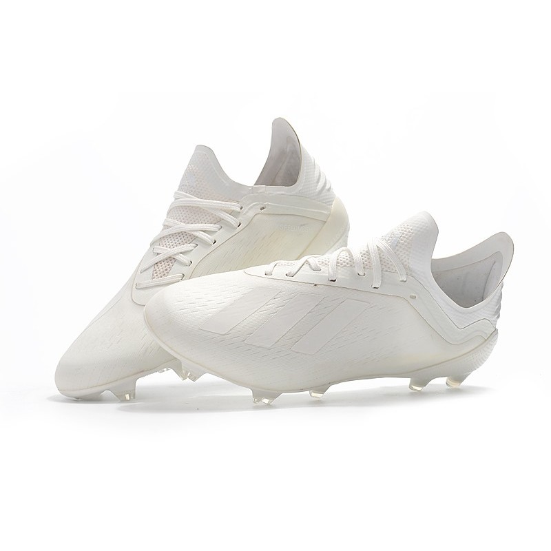 all white low top cleats