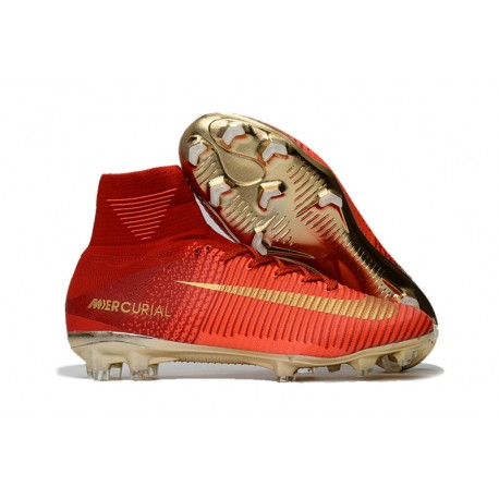 gold and red football cleats