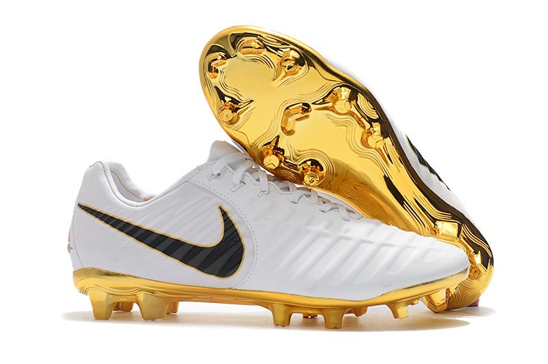 white and gold nike football boots