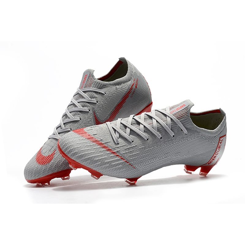 nike mercurial raised on concrete