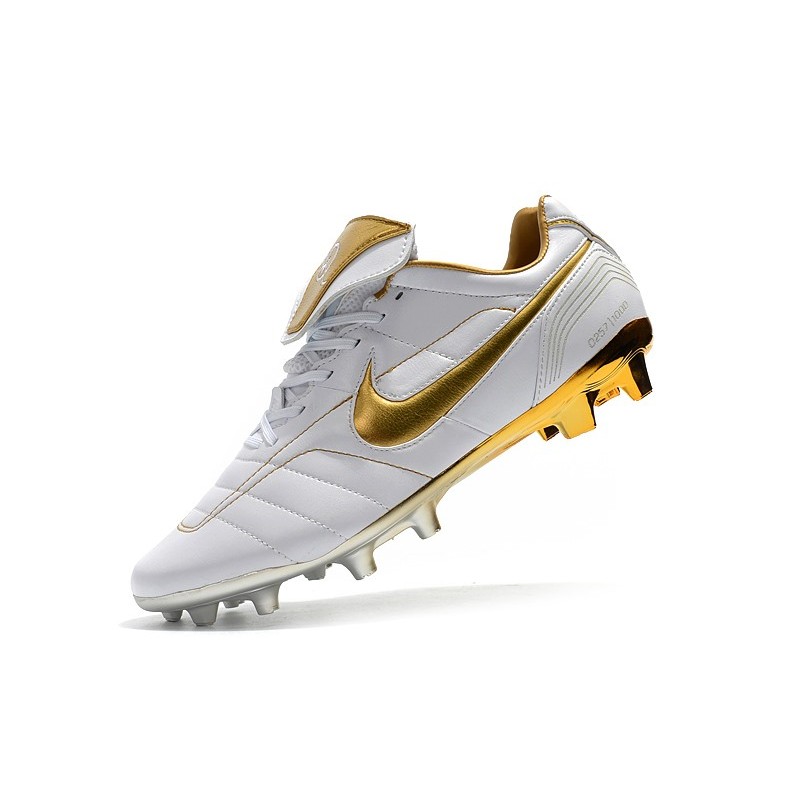 white and gold nike tiempo