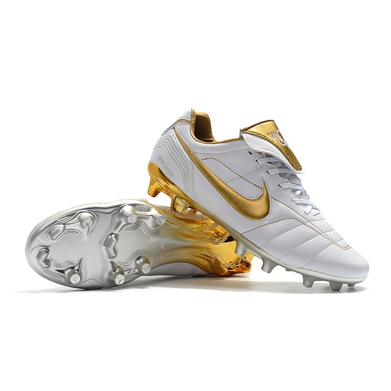 white and gold nike tiempo