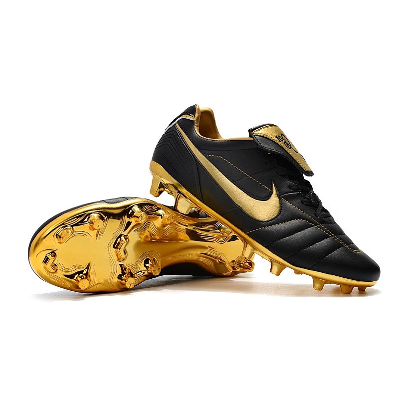 nike football boots black and gold