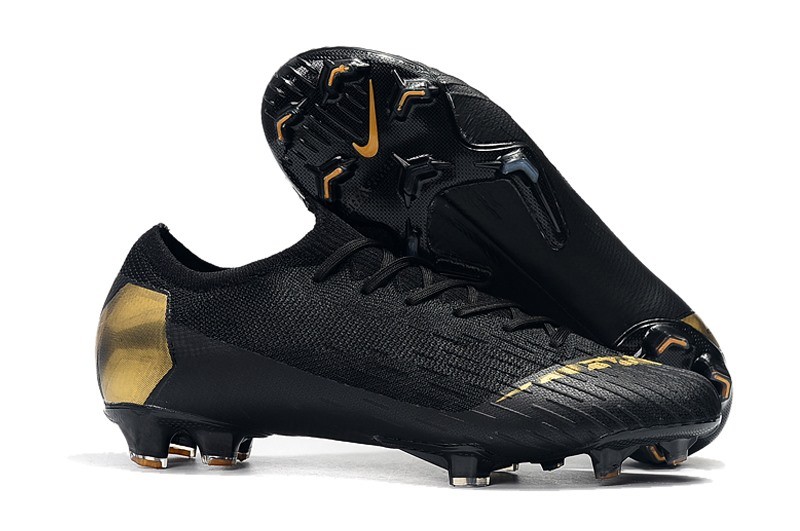 nike football boots black gold