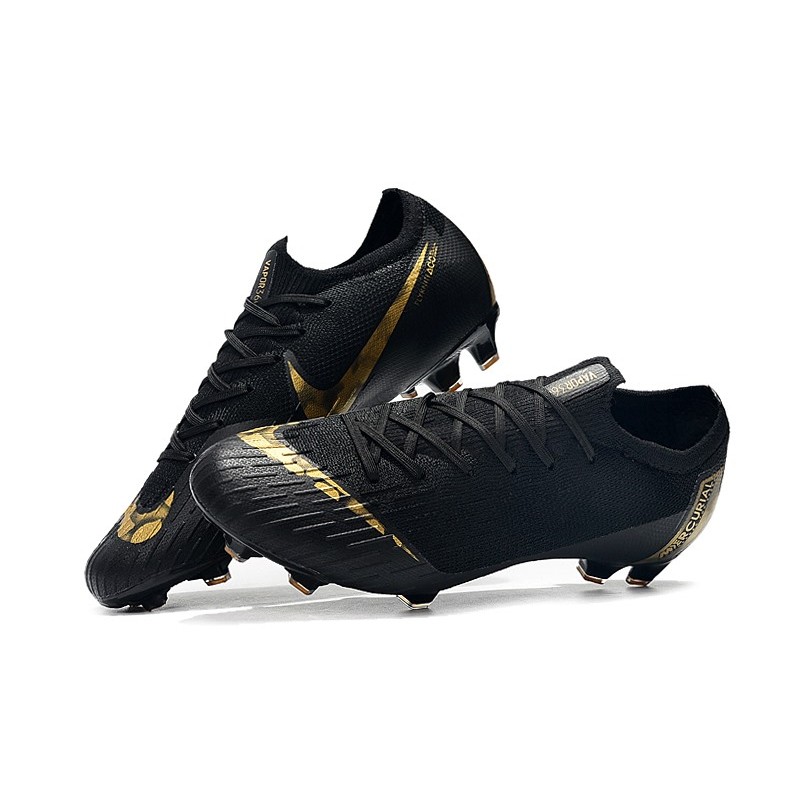 nike black gold boots