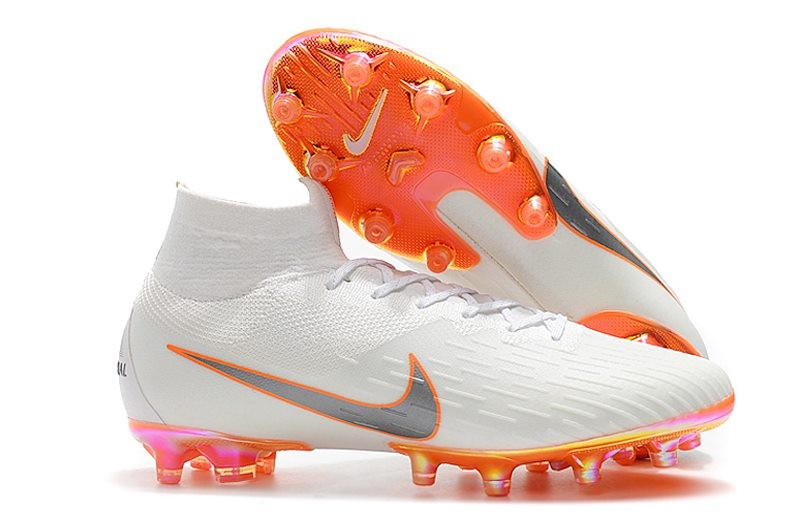 nike white and orange cleats