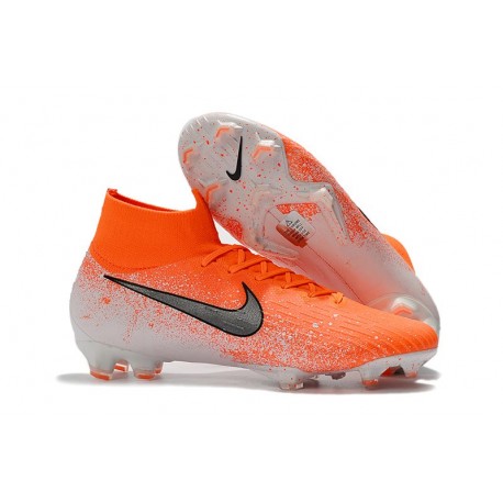 orange and white nike cleats