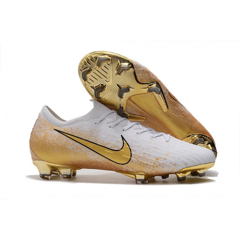 white and gold nike cleats