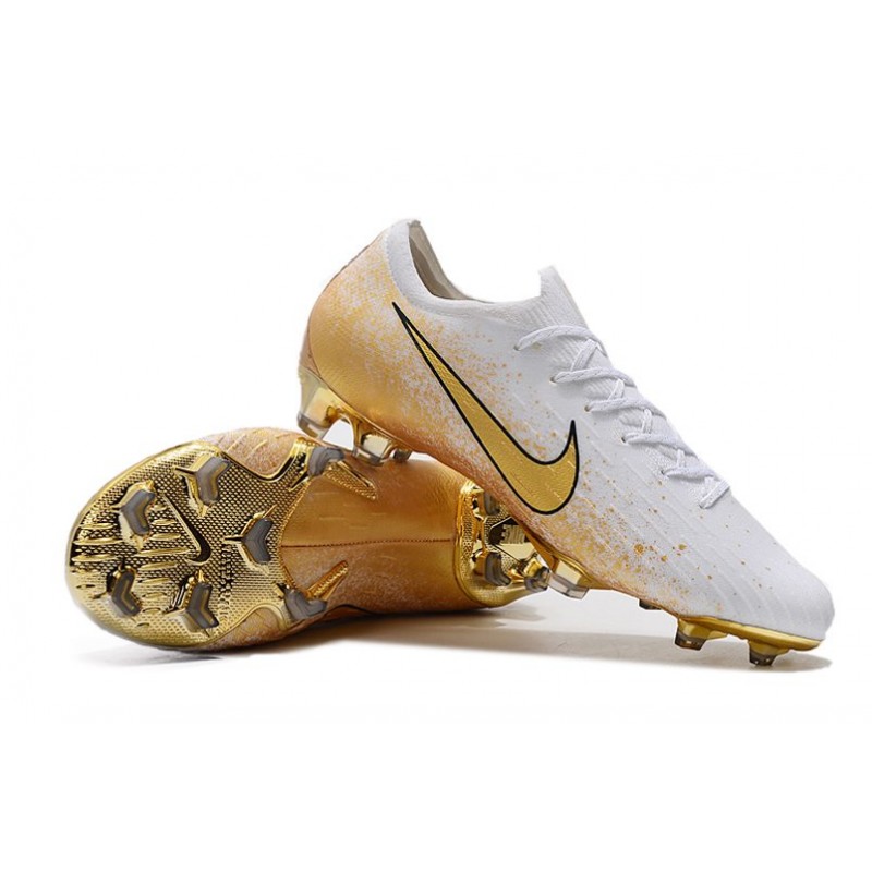 white and gold nike cleats