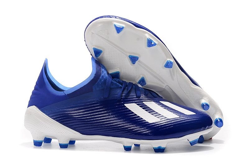 blue and white adidas soccer cleats