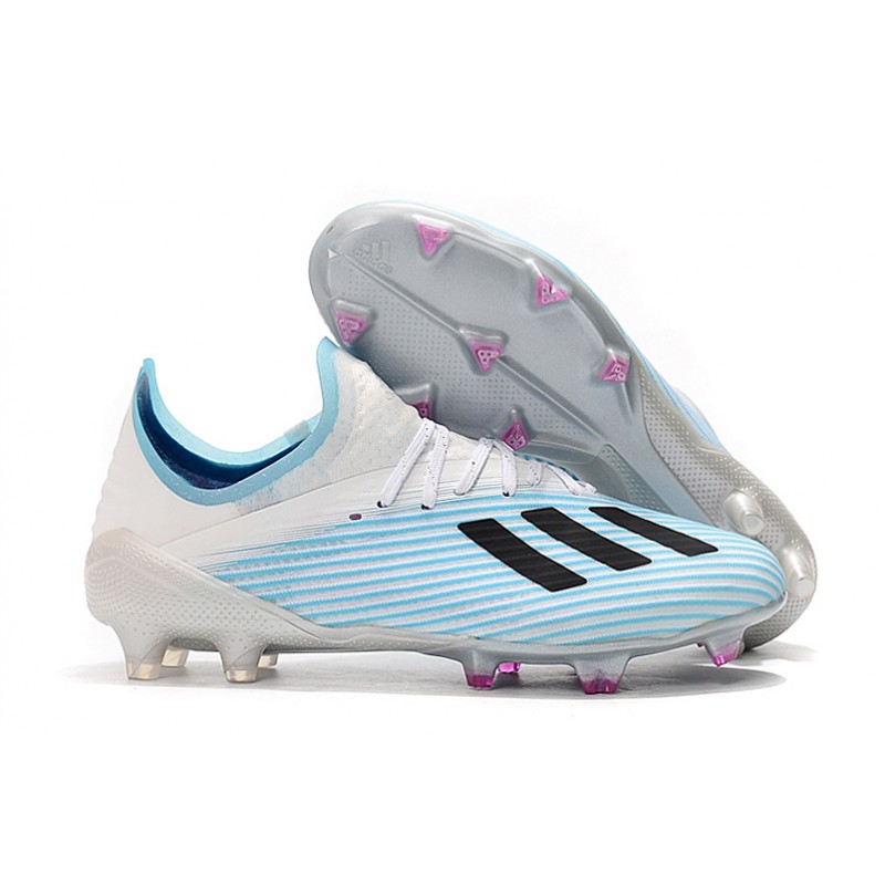 blue and white adidas soccer cleats