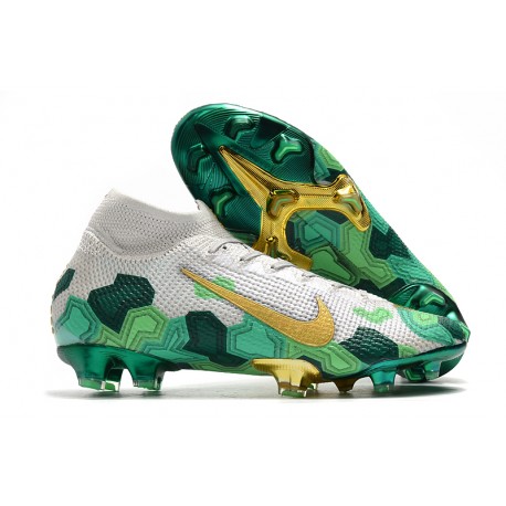 white and blue messi boots