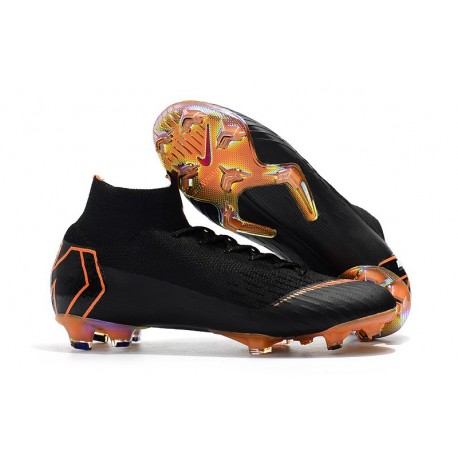 black and orange nike football boots