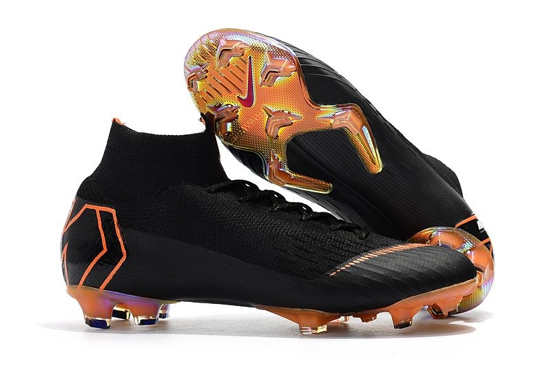 black and orange nike football boots