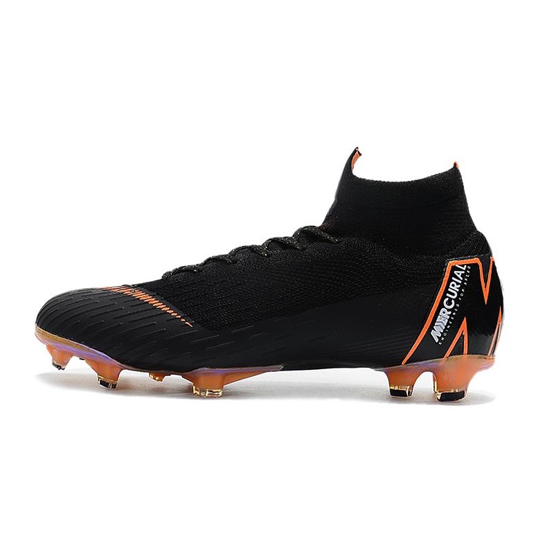 nike football boots black and orange